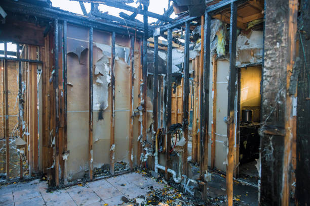 Professional Fire Damage Restoration technician working in Rogers City, MI